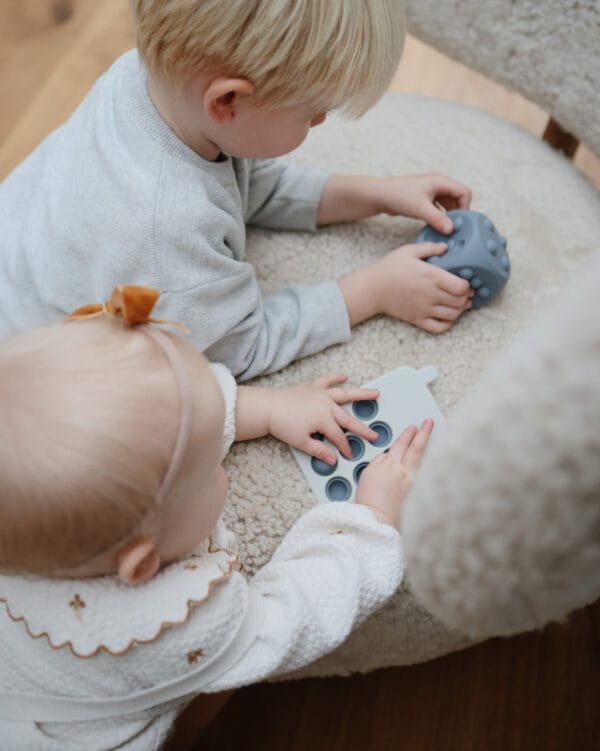 baby pop-it speelgoed mushie